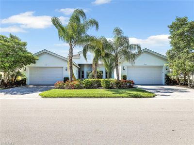 Single story home featuring a garage | Image 2