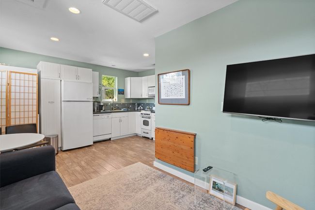 Living room featuring baseboards, visible vents, recessed lighting, and light wood-type flooring | Image 29