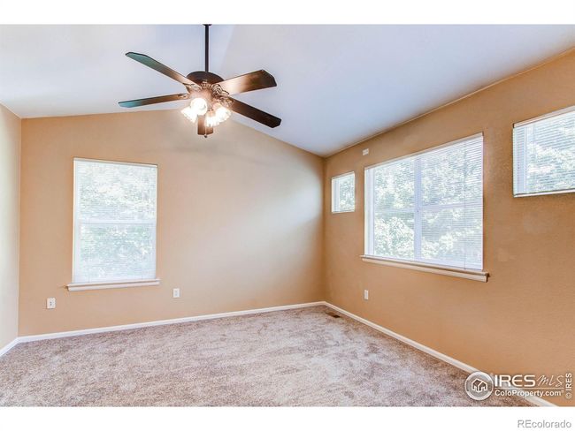 Primary bedroom is a true retreat, featuring a luxurious 5-piece bathroom and added privacy, as it is located separately from the other bedrooms | Image 16