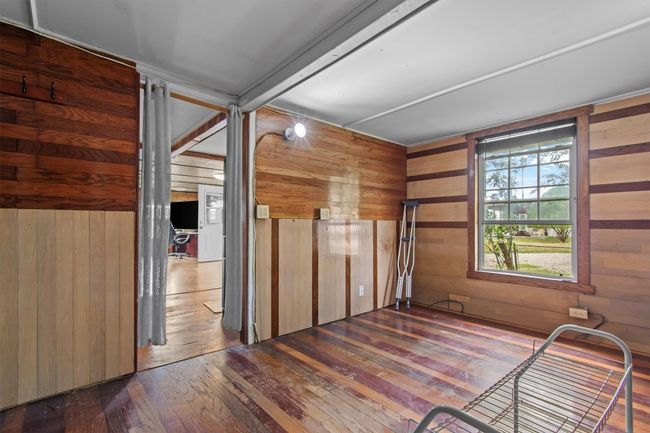 Nearby, a newer 800 sq ft duplex features two fully outfitted 400 sq ft units—each with a kitchen, tiled bath, and washer/dryer hookups—offering flexible guest or rental options. | Image 22