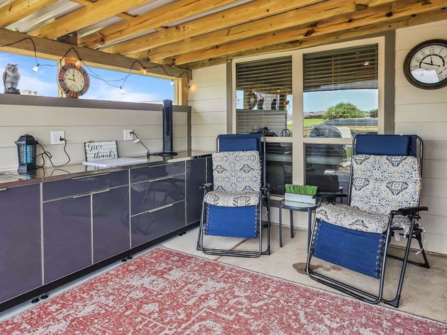 View of patio featuring an outdoor bar | Image 30