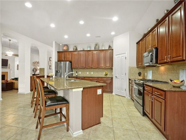 208 Raindance Cv, House other with 4 bedrooms, 3 bathrooms and 4 parking in Austin TX | Image 7