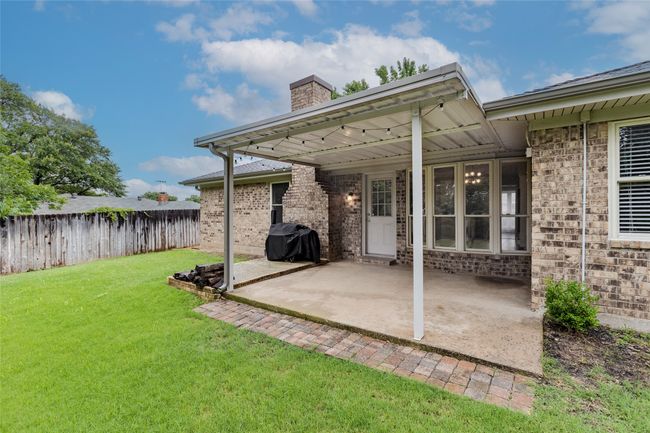 View of patio featuring grilling area | Image 30