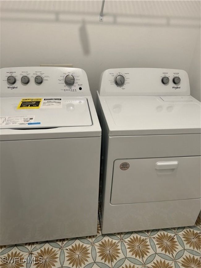 Washroom featuring washer and dryer | Image 20