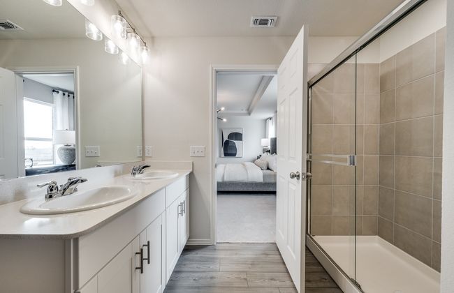 Elegant secondary Luxurious owner's bath complete with double sinks and a generous shower *Model representation | Image 14