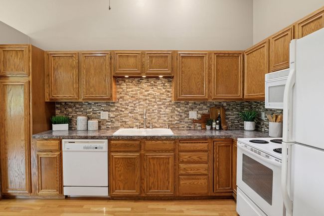 Tile backsplash in kitchen. | Image 13