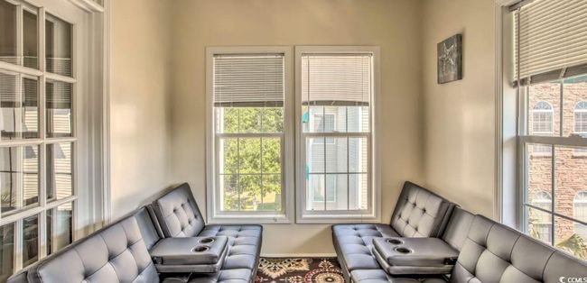 Living area with baseboards | Image 15