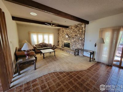 Family room with fireplace main level | Image 3