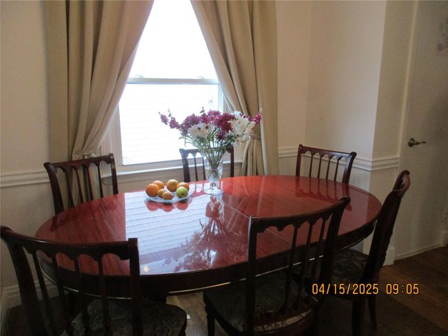 Dining space featuring wood finished floors | Image 18