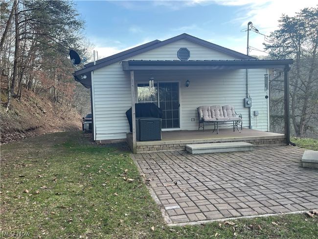 Rear view of house with a patio | Image 5