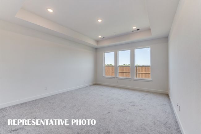The peaceful and relaxing owner's retreat is located at the rear of the home for additional privacy. REPRESENTATIVE PHOTO | Image 11