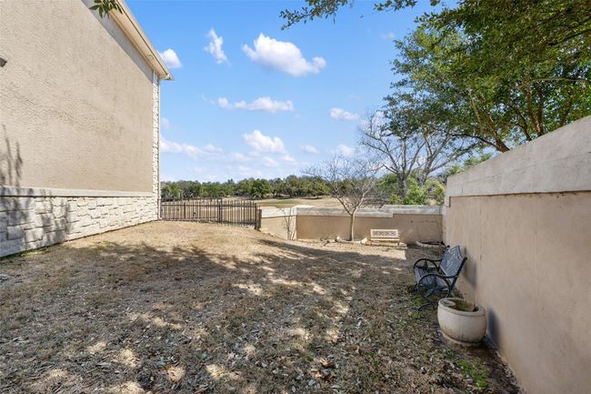 View of yard with a fenced backyard | Image 33
