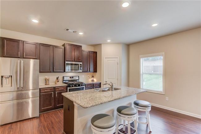 6841 Lancaster Xing, House other with 4 bedrooms, 3 bathrooms and 4 parking in Flowery Branch GA | Image 15
