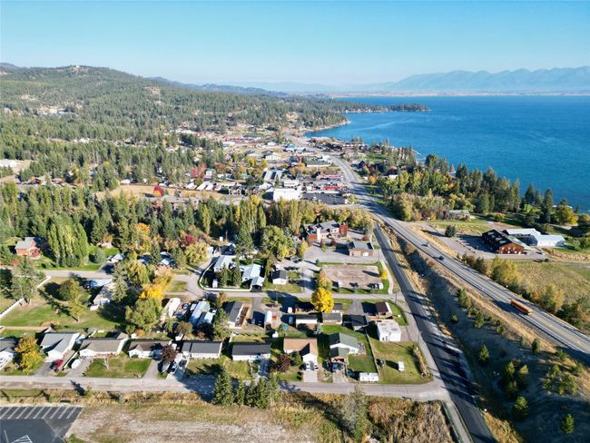 Birds eye view of property with a water and mountain view | Image 7