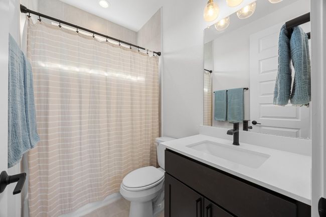 Bathroom with vanity, a shower with curtain, and recessed lighting | Image 17
