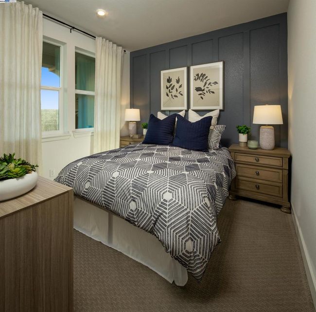 Photo is of the model home and not the actual home for sale. | Image 6
