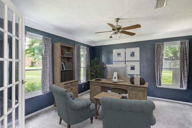 The enclosed office has views to the front yard and can also make a great den. Photo is virtually furnished. | Image 4