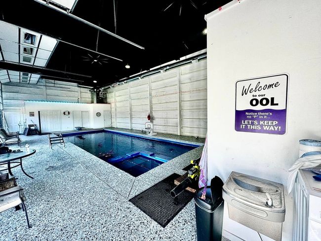 View of swimming pool room. Closed cell spray insulation with water proof paint. | Image 69