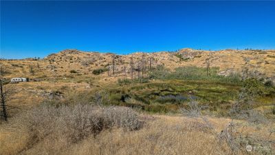 Welcome to your new property with a year round lake. Looking North from South area of property. | Image 1