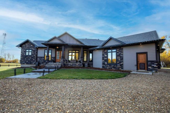 742062 51 Range, Home with 4 bedrooms, 2 bathrooms and 10 parking in Sexsmith AB | Image 1