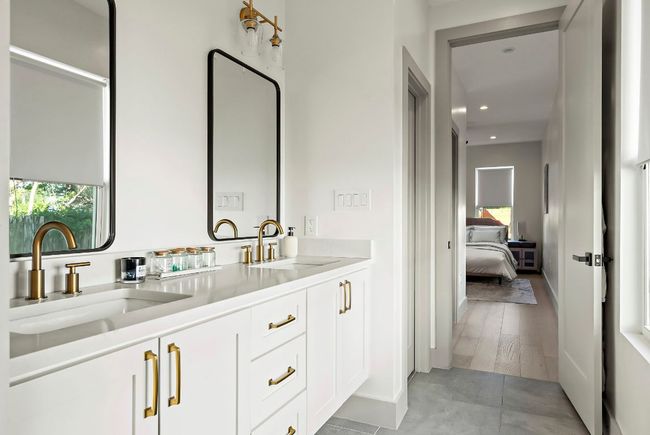 Full bath with recessed lighting, double vanity, connected bathroom, and a sink | Image 21