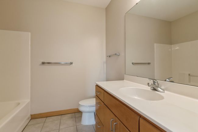 Three very large and nicely cared for bathrooms. (The photos are of unit 401. Owned by the same person and finishes that are VERY similar) | Image 15