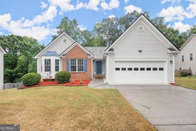 2979 Merrion Park Lane, House other with 7 bedrooms, 3 bathrooms and 2 parking in Dacula GA | Image 3