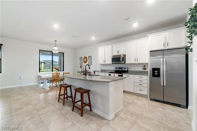 17360 Ashcomb Way, House other with 4 bedrooms, 2 bathrooms and null parking in Estero FL | Image 3