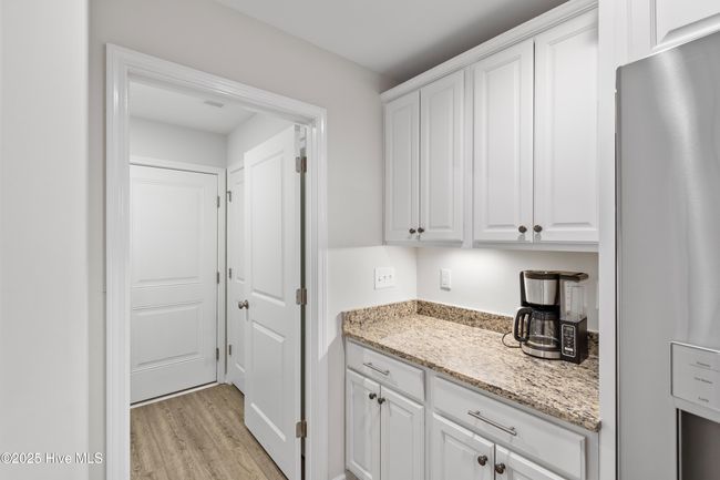 From kitchen looking toward laundry room | Image 6