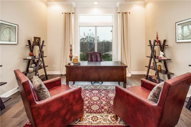 Office area with baseboards, ornamental molding, and wood finished floors | Image 28