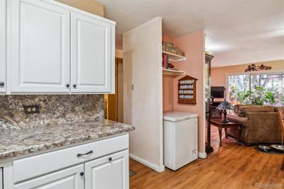 Kitchen has nook for extra storage/shelving | Image 3