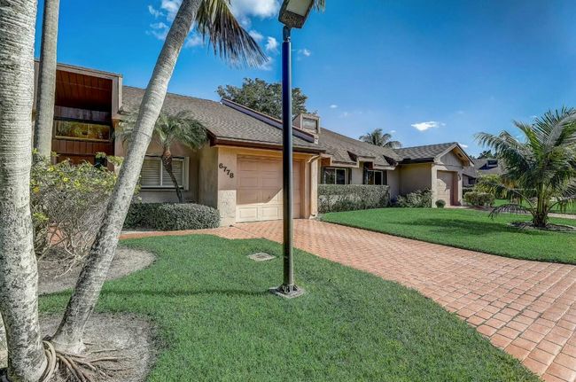 6778 Versailles Ct, Condo with 2 bedrooms, 3 bathrooms and null parking in Lake Worth FL | Image 29
