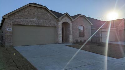 View of front of home with a garage | Image 3