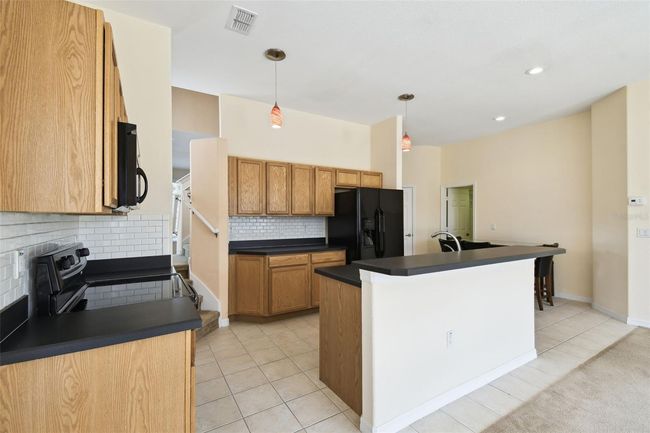 Stairway access from Kitchen | Image 6