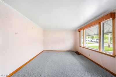 Carpeted living room | Image 3