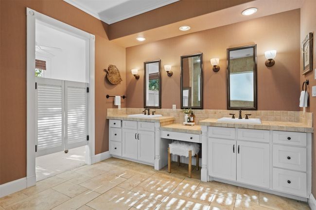 Bathroom with a sink, baseboards, double vanity, and recessed lighting | Image 18