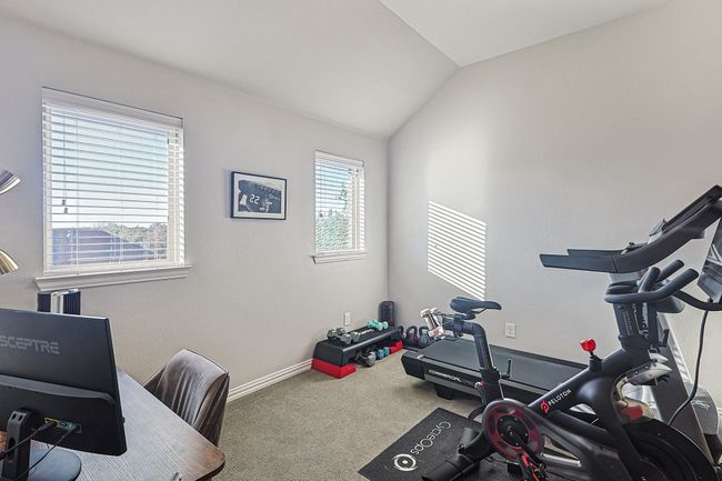 This room off of the Game Room can be a play room or home gym space. | Image 26