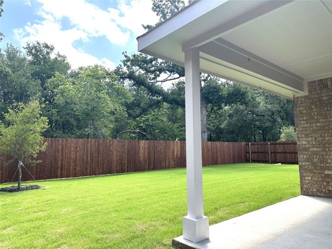 Fenced backyard featuring a patio | Image 25