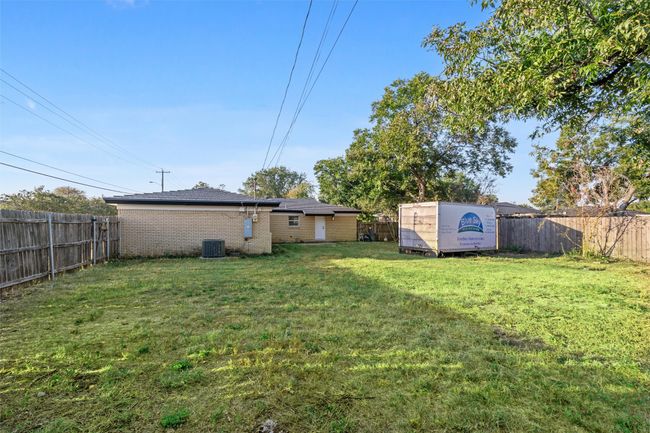 View of yard featuring central AC | Image 36