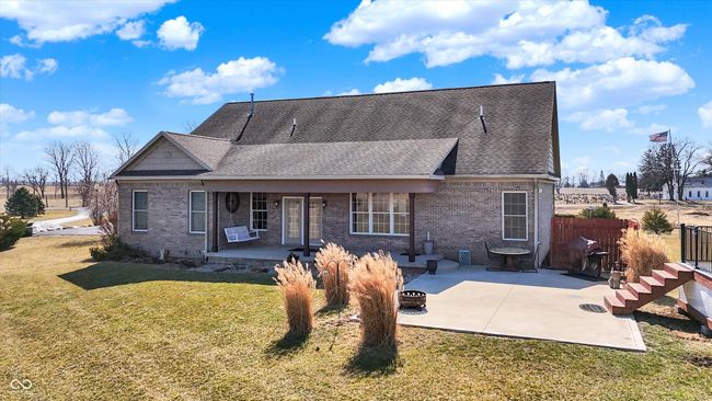 Imagine the entertaining with the covered back patio, open patio area and a swimming pool | Image 64