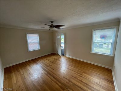 Living room, ceiling fan, hardwood floor | Image 2