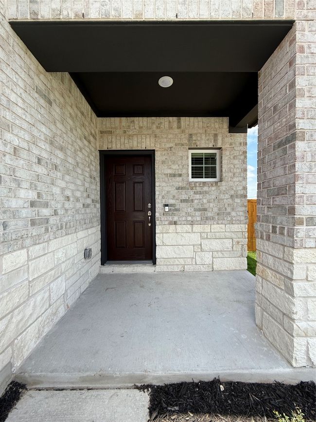 Entrance to property with brick siding | Image 4