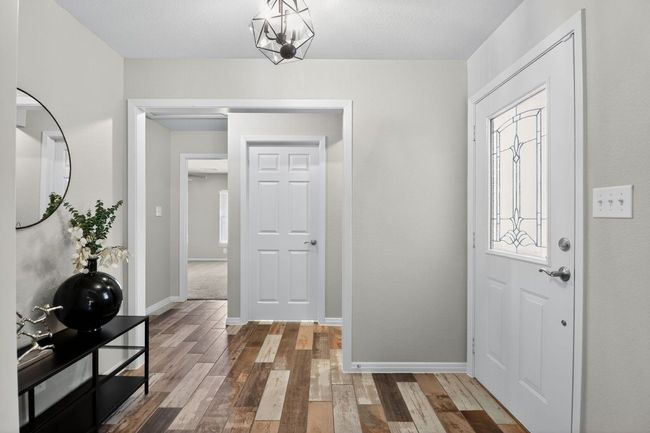 Entry Way with Access to Laundry Room and Primary Bedroom | Image 6