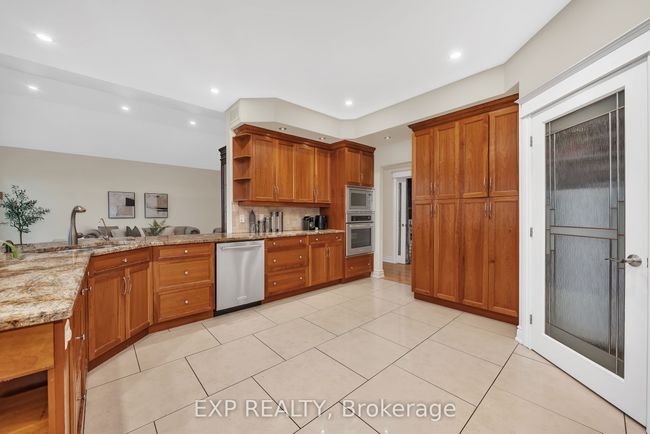 6703 Suncrest Dr, House other with 6 bedrooms, 5 bathrooms and 8 parking in Greely ON | Image 9