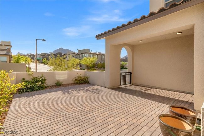 View of patio / terrace with fence and a residential view | Image 18