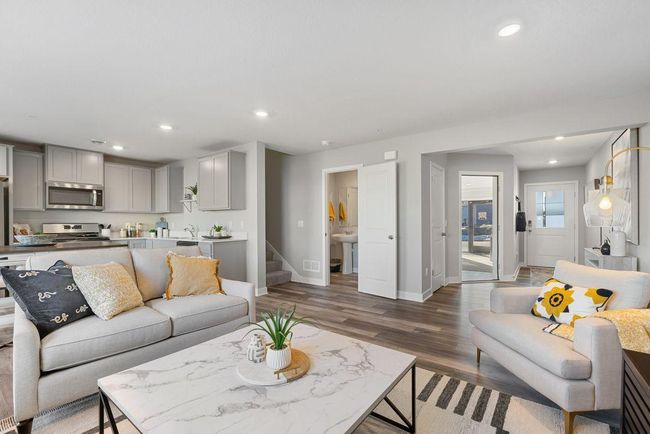 Spacious living room of this open concept main floor! | Image 4