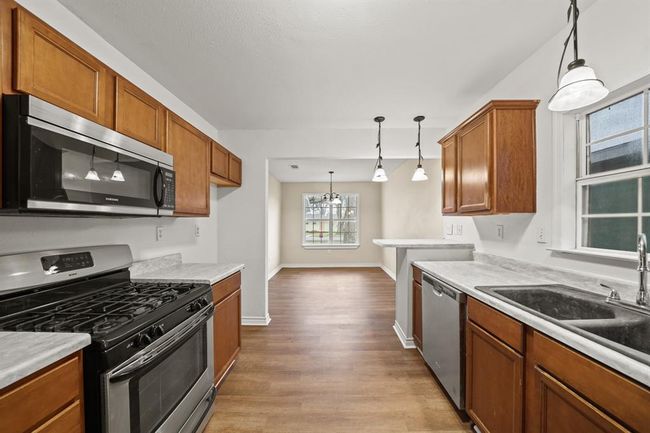 The breakfast area is conveniently off the kitchen and is perfect for your morning coffee! Relax before work or enjoy a nice meal with the family. | Image 10