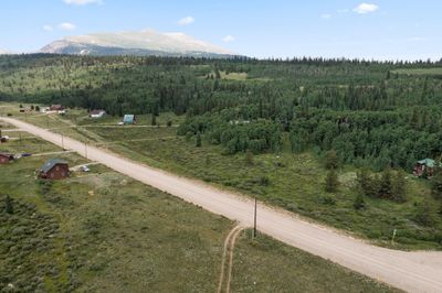 Birds eye view of property with a mountain view | Image 1