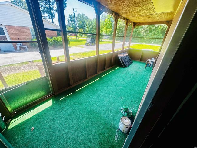 View of unfurnished sunroom | Image 20