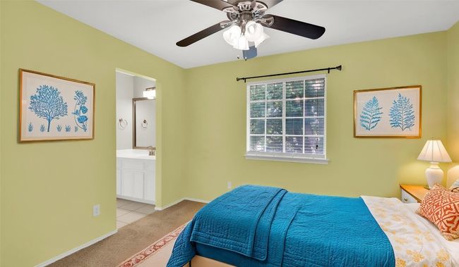 Bedroom with carpet, Jack and Jill bath, baseboards, ceiling fan (virtaully staged) | Image 18